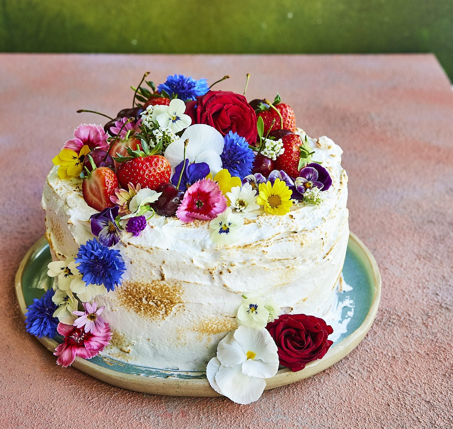 Premium Photo | Creamy fruit cake and fresh flowers